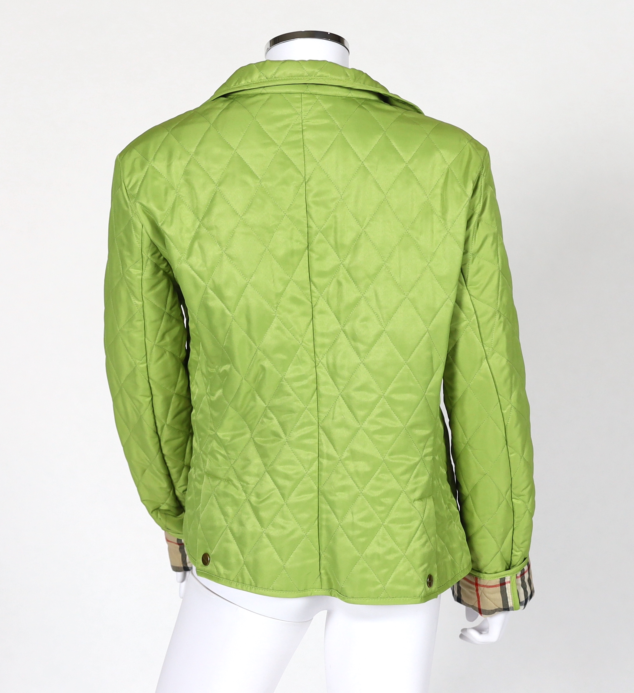 Two Burberry lady's quilted jackets, one pink and the other green, size Medium